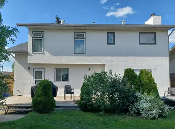 New finish over traditional stucco — after