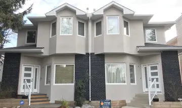 Eifs stucco over traditional stucco — after