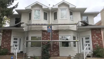 Eifs stucco over traditional stucco — before