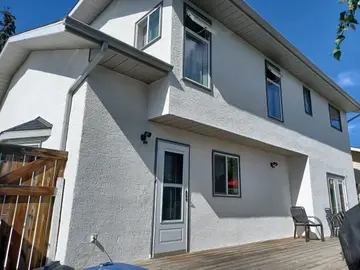 New finish over traditional stucco — after