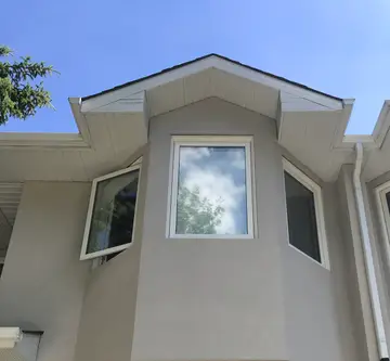 Eifs stucco over traditional stucco — after