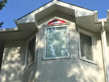Eifs stucco over traditional stucco — before