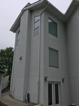 Stucco remove and re do — before