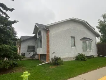New finish over traditional stucco — before