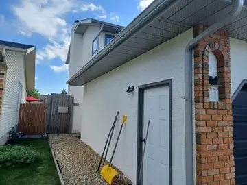 New finish over traditional stucco — after