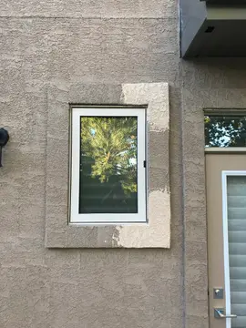 Small stucco repairs — before